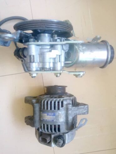 Toyota IST Alternator, power steering pump, cylinder head STD